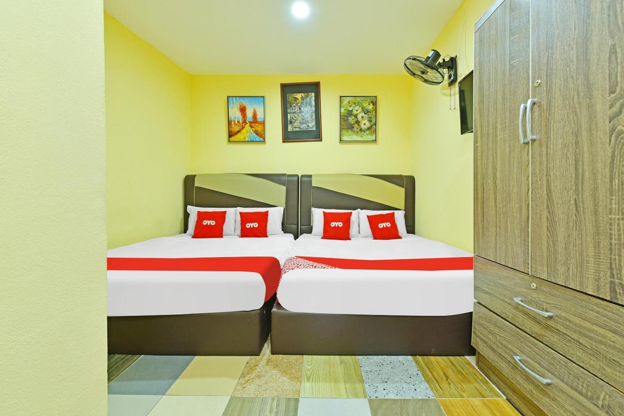 Oyo 873 Bamboo Inn Batu Ferringhi Extérieur photo